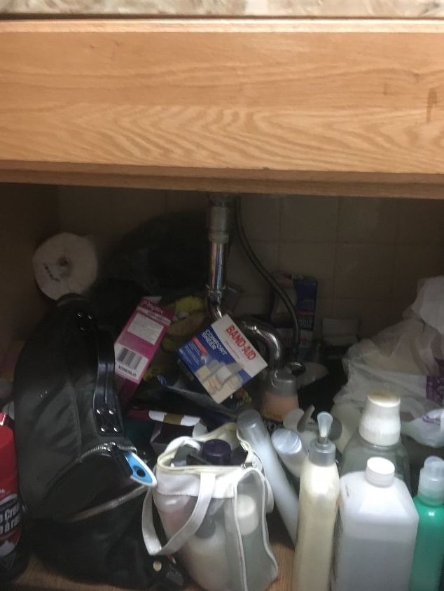 q how can i organize my under the sink in the bathroom