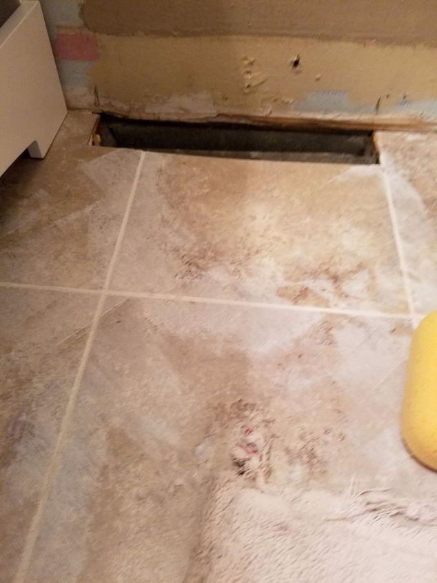 q my contractor said grout had to dry 24 hrs before wiping it off