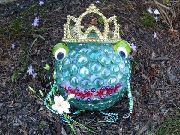 s 30 garden art ideas to fall in love with, Recreate A Frog Prince With Glass Lamp Globe