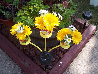 s 30 garden art ideas to fall in love with, Use A Candlestick As A Plant Holder