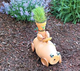 s 30 garden art ideas to fall in love with, Create A Race Car With Terra Cotta Pots