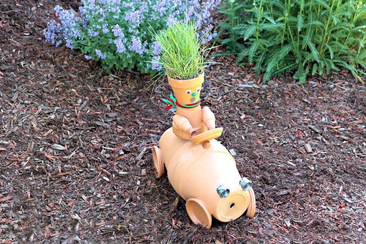 s 30 garden art ideas to fall in love with, Create A Race Car With Terra Cotta Pots