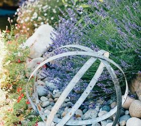 s 30 garden art ideas to fall in love with, Put A Wine Barrel In The Center Of The Garden