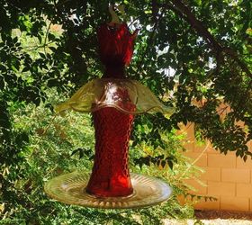 s 30 garden art ideas to fall in love with, Recycle Old Glass Into Hangers