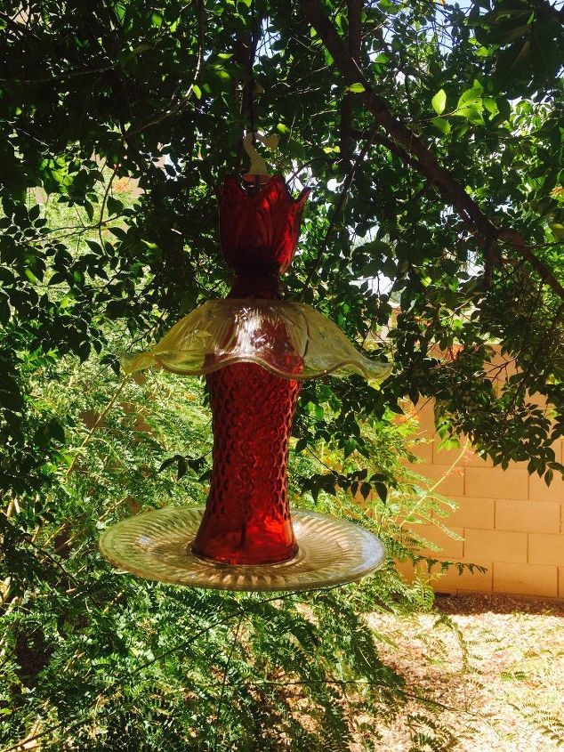 s 30 garden art ideas to fall in love with, Recycle Old Glass Into Hangers