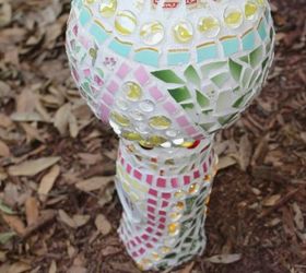 s 30 garden art ideas to fall in love with, Pair A Vase And Globe Together For Art