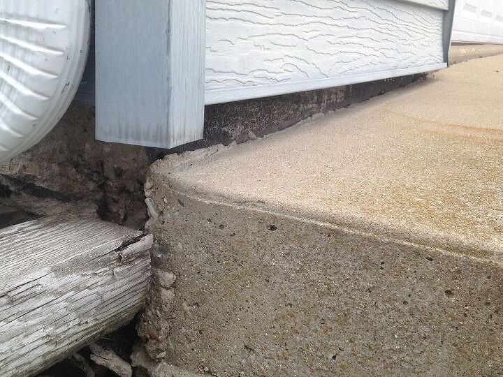 q my driveway is sinking on one side can anyone help