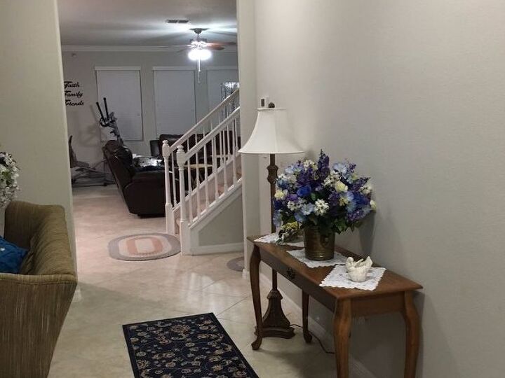 q how can i decorate a hall way to incorporate it into the room