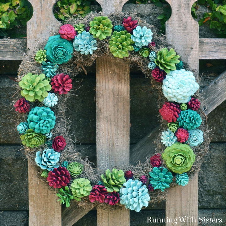 s 17 tricks to make a gorgeous wreath in half the time, Craft Faux Succulents With Pine Cones
