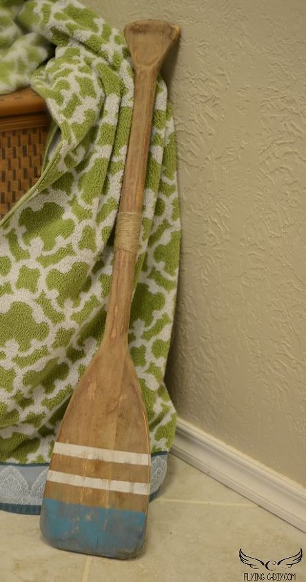 31 coastal decor ideas perfect for your home, Upcycle A Beach Paddle With Paint