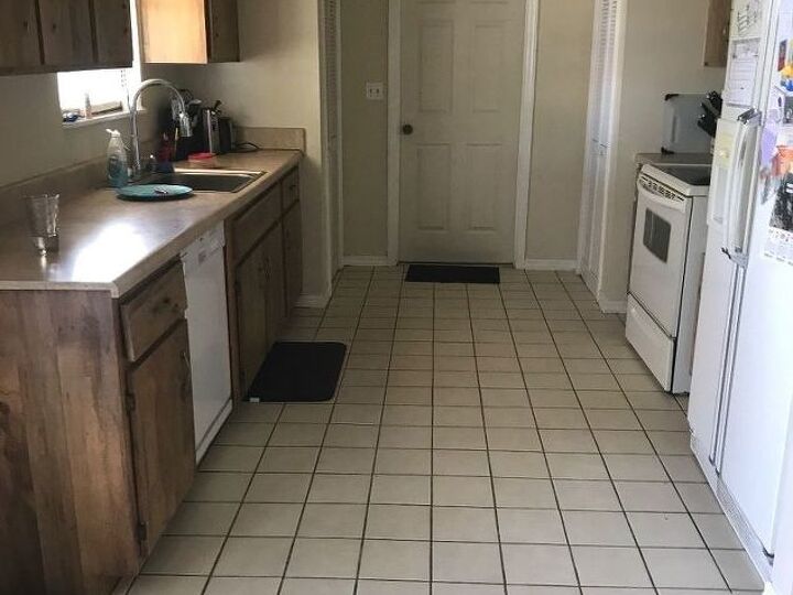 q what is the best way to clean tile grout