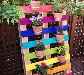 s 10 wonderful ways to use pallets and the results are beautiful, Paint A Rainbow Pallet For A Garden