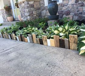 s 10 wonderful ways to use pallets and the results are beautiful, Hammer Down Pallet Pieces For A Garden Border