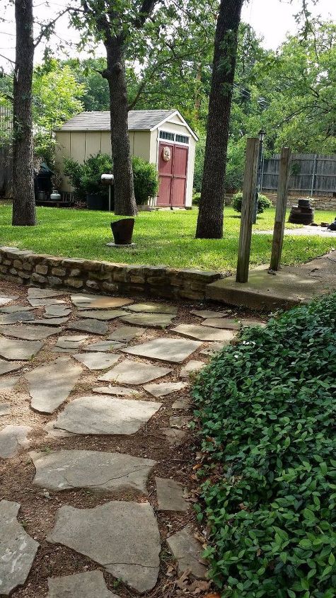 best option for a flagstone area to get grass or moss grow