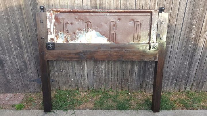 queen size headboard made using a tailgate from a 1930s ford truck