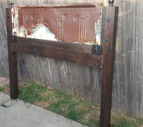 queen size headboard made using a tailgate from a 1930s ford truck