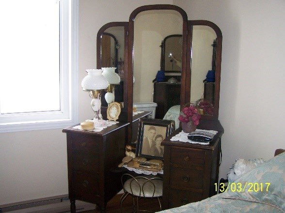 q how to clean up an antique dresser
