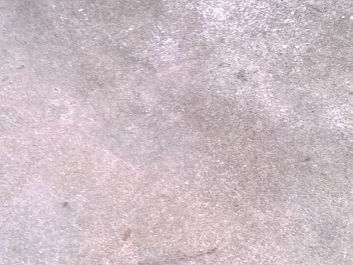q cleaning concrete walk and driveway