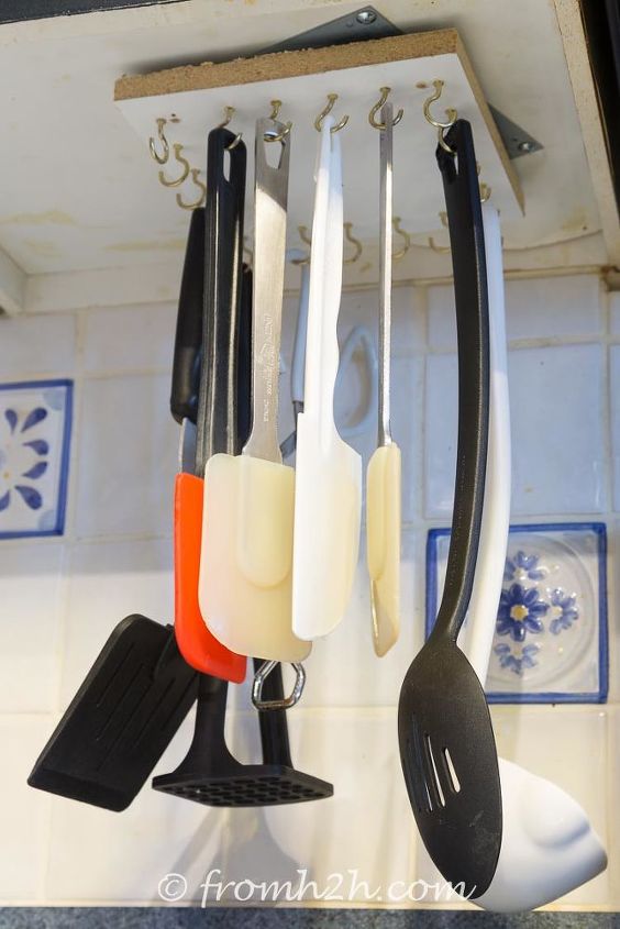 storage hacks that will instantly declutter your kitchen, Hang your cooking utensils upside down
