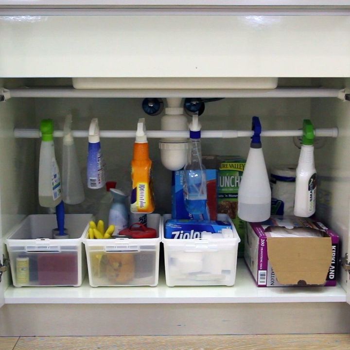 storage hacks that will instantly declutter your kitchen, Stay neat under the kitchen sink