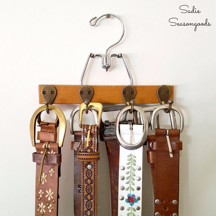 s 31 ways to keep your home organized, Get Your Belts In Order With A Mini Hanger