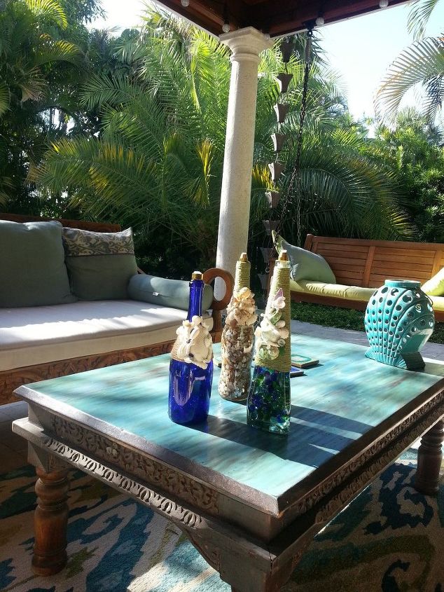 s 31 coastal decor ideas perfect for your home, Create Coastal Torches From A Wine Bottle