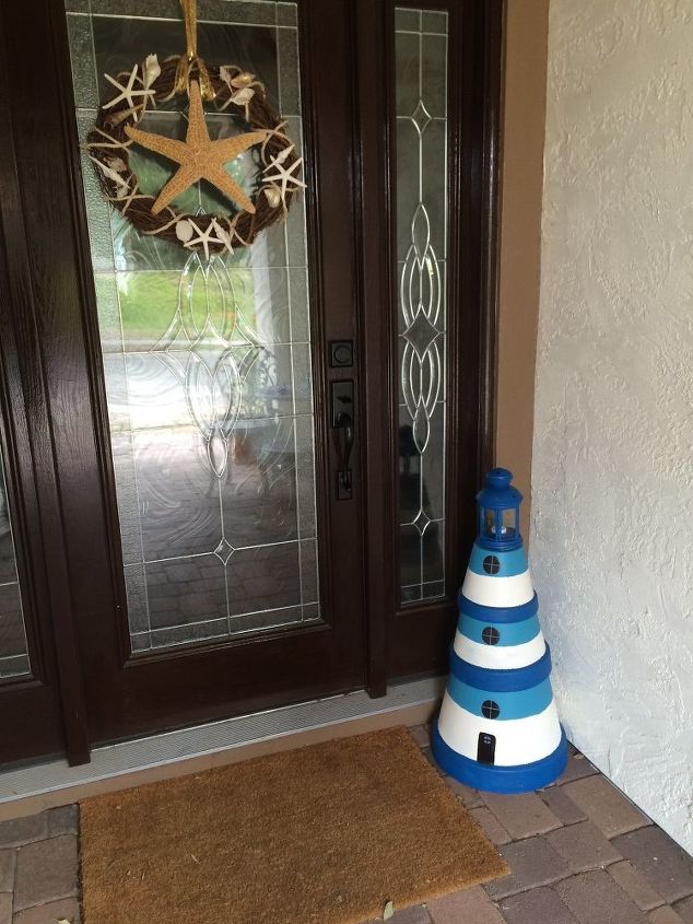 s 31 coastal decor ideas perfect for your home, Build A Lighthouse With Terra Cottas