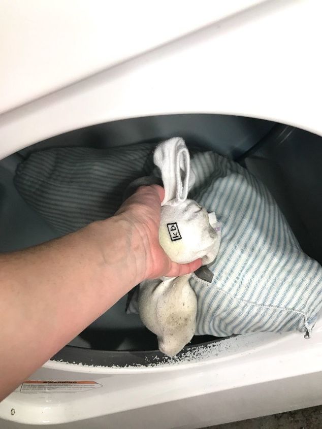 30 essential hacks for cleaning around your home, Brighten Yellow Pillows With Tennis Balls