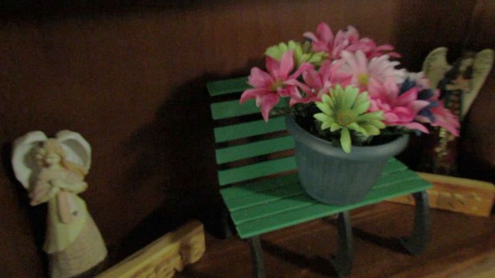 a cute little park bench plant stand