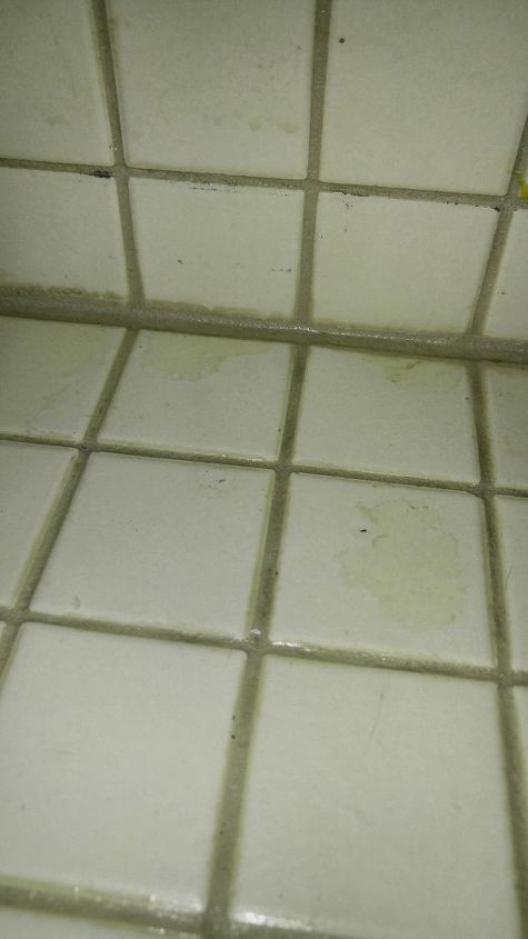 q how to remove grout sealer from tile