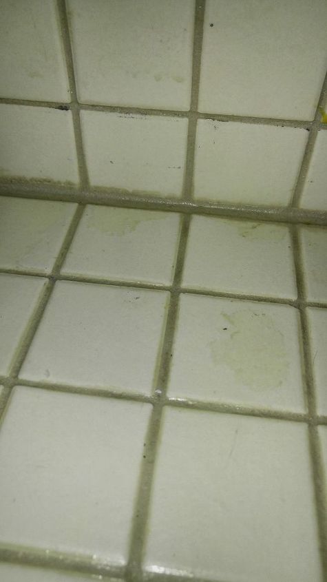 q how to remove grout sealer from tile
