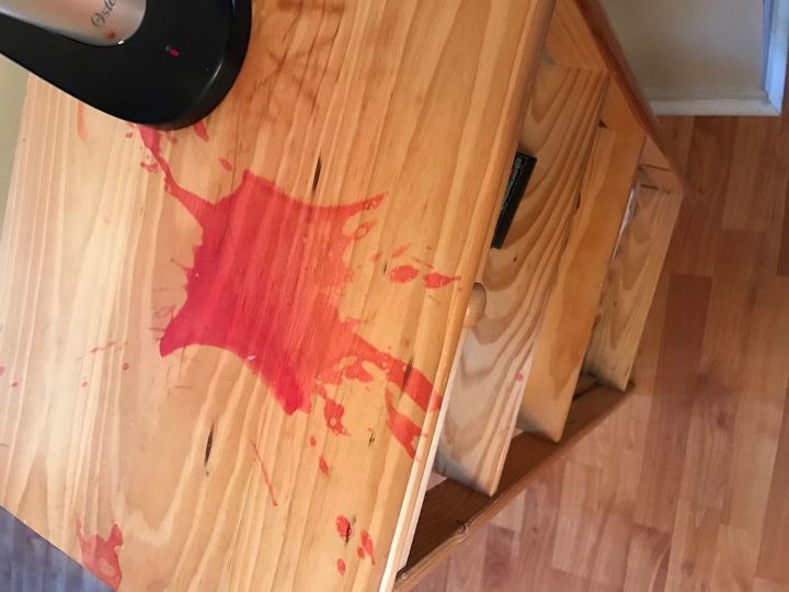q how to remove candle wax stain from a light colored wood table
