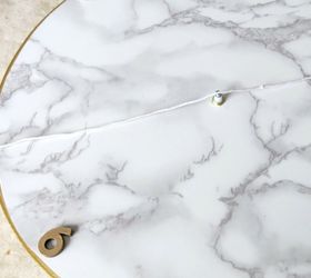 s 31 astounding things you didn t know you could do with contact paper, Create a marble contact paper clock