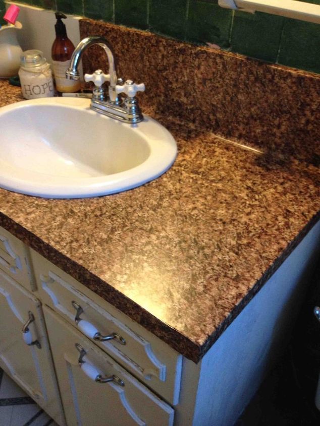 s 31 astounding things you didn t know you could do with contact paper, Turn your plastic vanity into granite