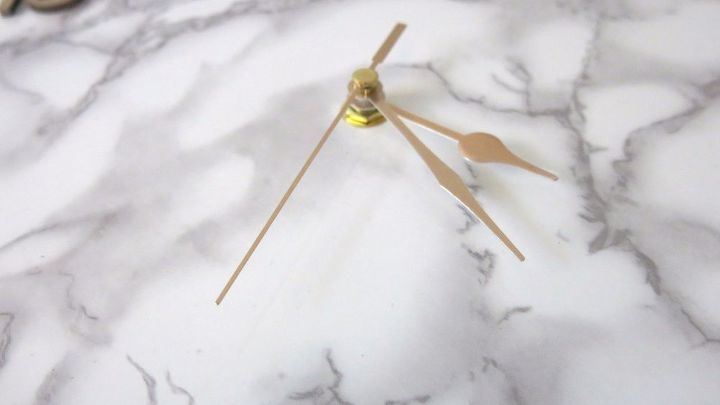 s 31 astounding things you didn t know you could do with contact paper, Create a marble contact paper clock