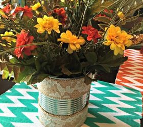 s 15 super affordable ways to decorate for any season, Reuse An Empty Can To Display Flowers