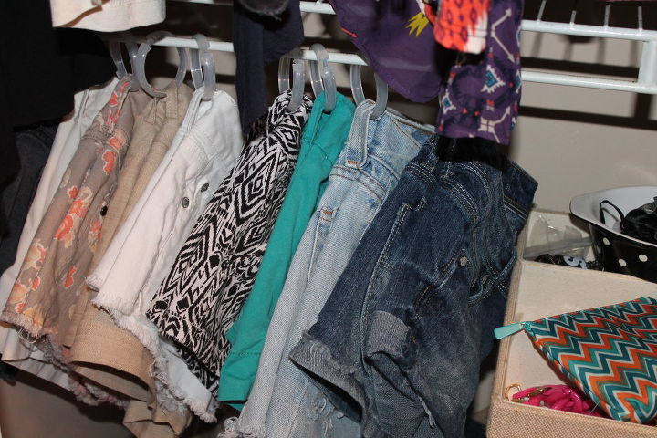 23 surprising uses for curtain rings, Organize your shorts with ease