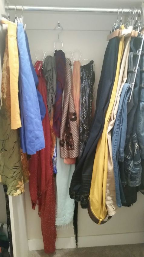 32 space saving storage ideas that ll keep your home organized, Add cable straps to a closet wall fit more