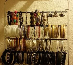 32 space saving storage ideas that ll keep your home organized, Organize your jewelry on a pants hanger
