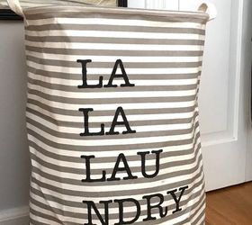 32 space saving storage ideas that ll keep your home organized, Build A Rolling Laundry Basket With A Barrel