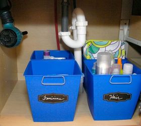 32 space saving storage ideas that ll keep your home organized, Organize your under the sink with bins