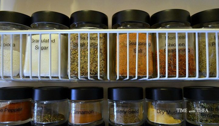 32 space saving storage ideas that ll keep your home organized, Use jars to organize your spices
