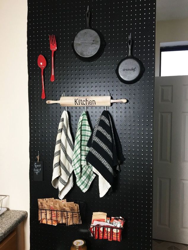 32 space saving storage ideas that ll keep your home organized, Turn a blank wall into a peg board