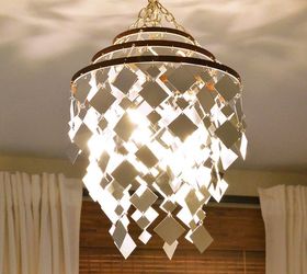 30 stylish update ideas you ll want to use for your bedroom, Make a DIY light from shimmering mirrors