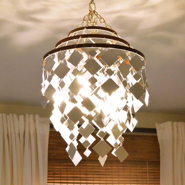 30 stylish update ideas you ll want to use for your bedroom, Make a DIY light from shimmering mirrors