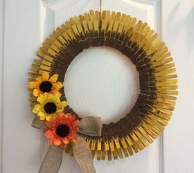 s 31 fabulous wreath ideas that will make your neighbors smile, Make a sunflower from clothespins