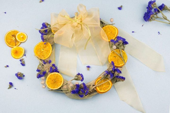 s 31 fabulous wreath ideas that will make your neighbors smile, Replace Fake Flowers With Dried Flowers