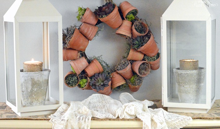 s 31 fabulous wreath ideas that will make your neighbors smile, String together live flower pots