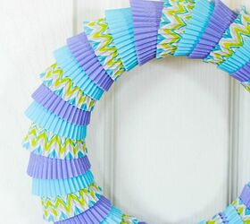 s 31 fabulous wreath ideas that will make your neighbors smile, Wrap cupcake liners around a wreath ring