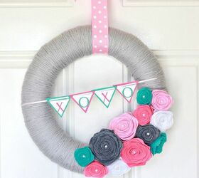 s 31 fabulous wreath ideas that will make your neighbors smile, Make one using a straw wreath yarn felt